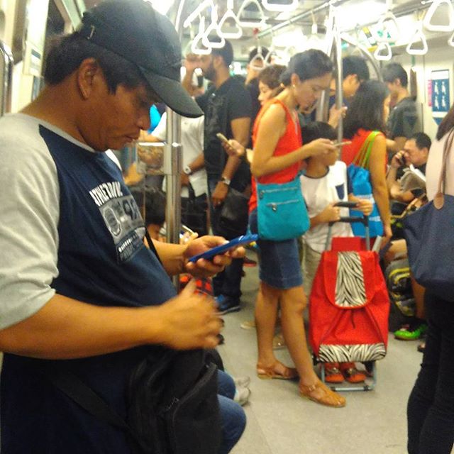 Back to the multi-racial, pole-leaning, everyone looking at phone, train-riding Singapore. :D